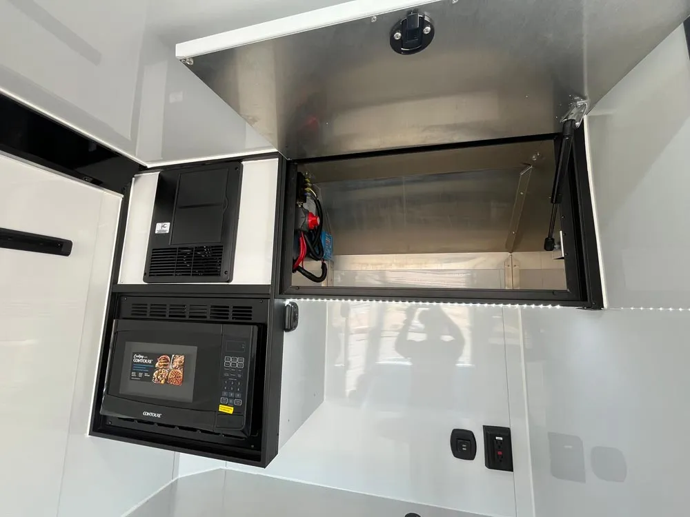 8.5 x 24 ATC ROM 450 Sport/Car Hauler Polar White top cabinet open