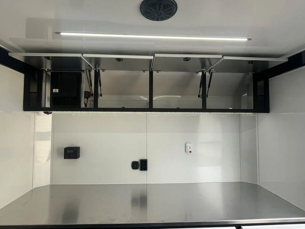 8.5 x 28 ATC ROM 550 Sport/Car Hauler Med Charcoal Top Cabinets Open