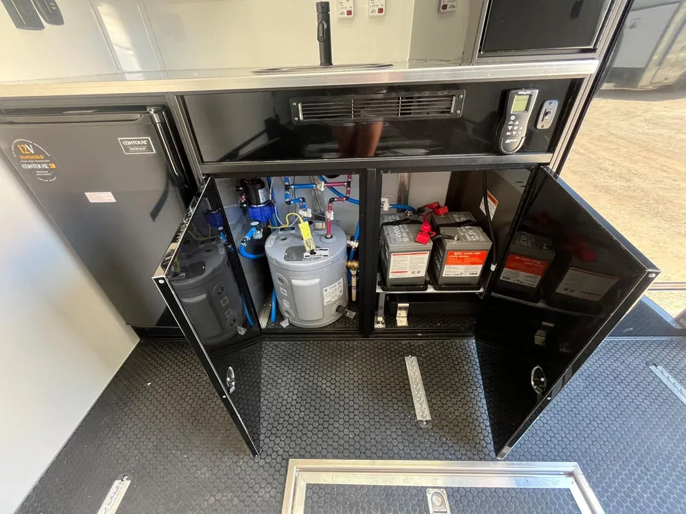 8.5 x 32 ATC ROM 550 Sport/Car Hauler Polar White bottom cabinets open
