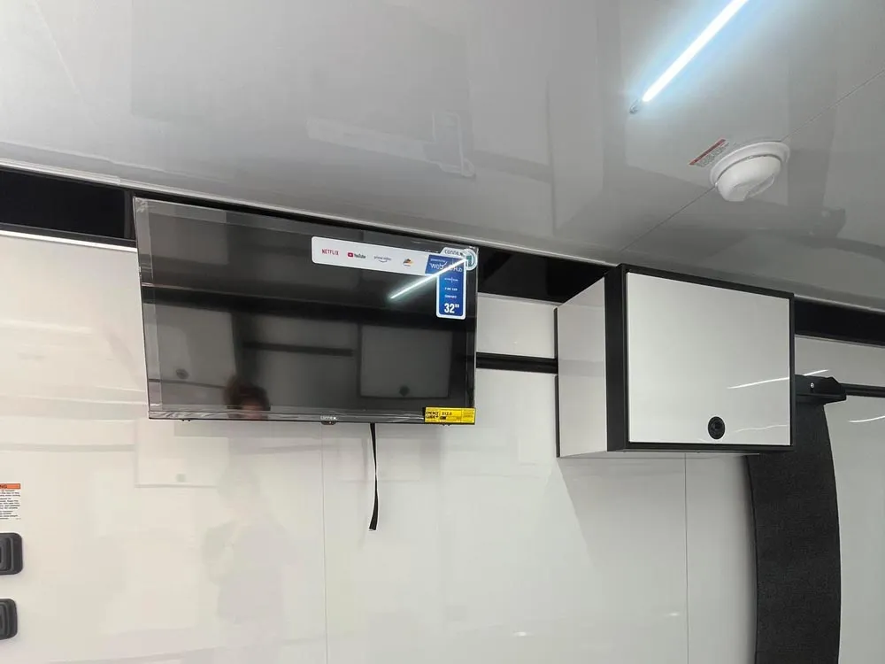 8.5 x 32 ATC ROM 550 Sport/Car Hauler Polar White tv on wall